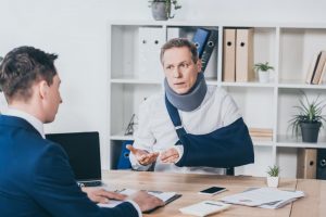 injured man w/ lawyer