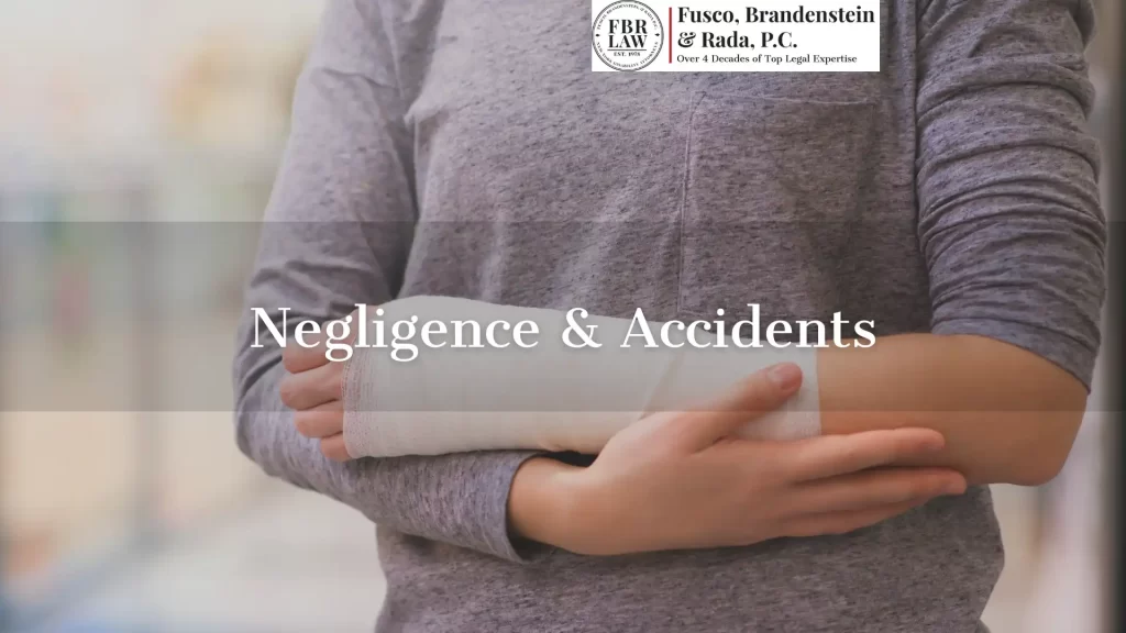 Negligence & Accidents text overlay with an injured person holding their injured had in the background